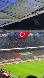 Turkish fans wave a huge Palestinian flag on the stands during the sports summit that brought together "Trabzonspor" and "Glatsaray" on the territory of the "Babara Park" stadium in the city of Trabzon.